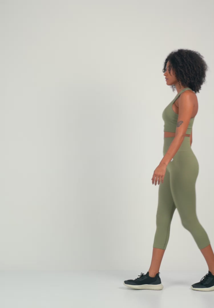 Color_Olive | A Woman Wearing Olive Color Zen Perfect Seamless Mid-Impact Sports Bra With Padding