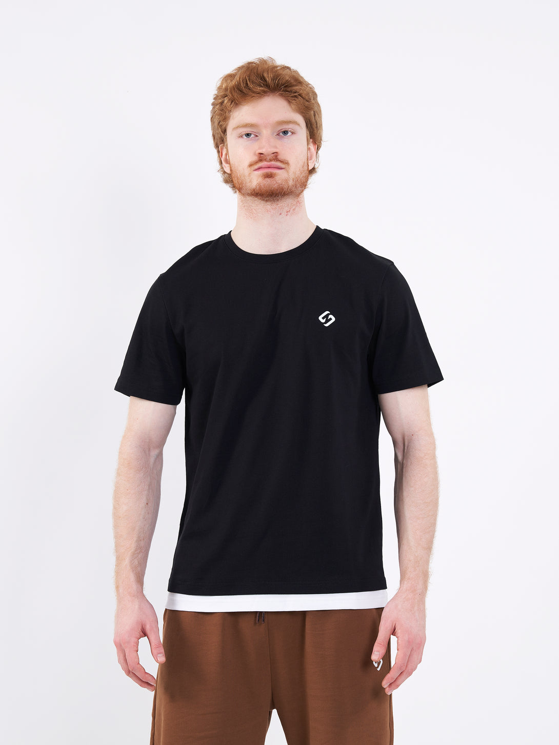 A Man Wearing Deep Black Color Men's Layered Heavyweight Crew Neck T-Shirt. Regular Fit
