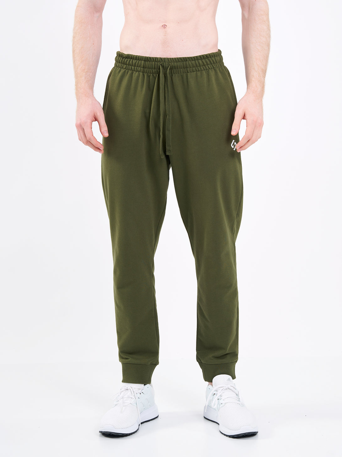 A Man Wearing Zen Khaki Color Men's Essential Comfort Joggers. Regular Fit