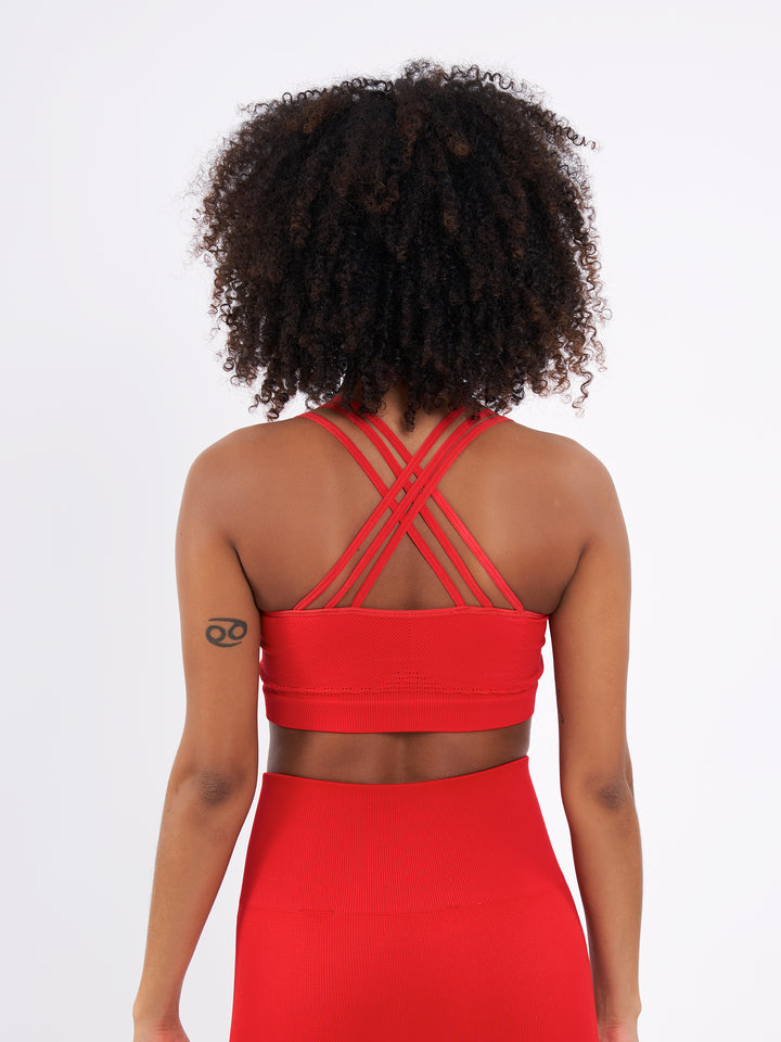 A Woman Wearing Bright Red Color Easy-Move Seamless Ribbed Crop Top for All-Day Wear