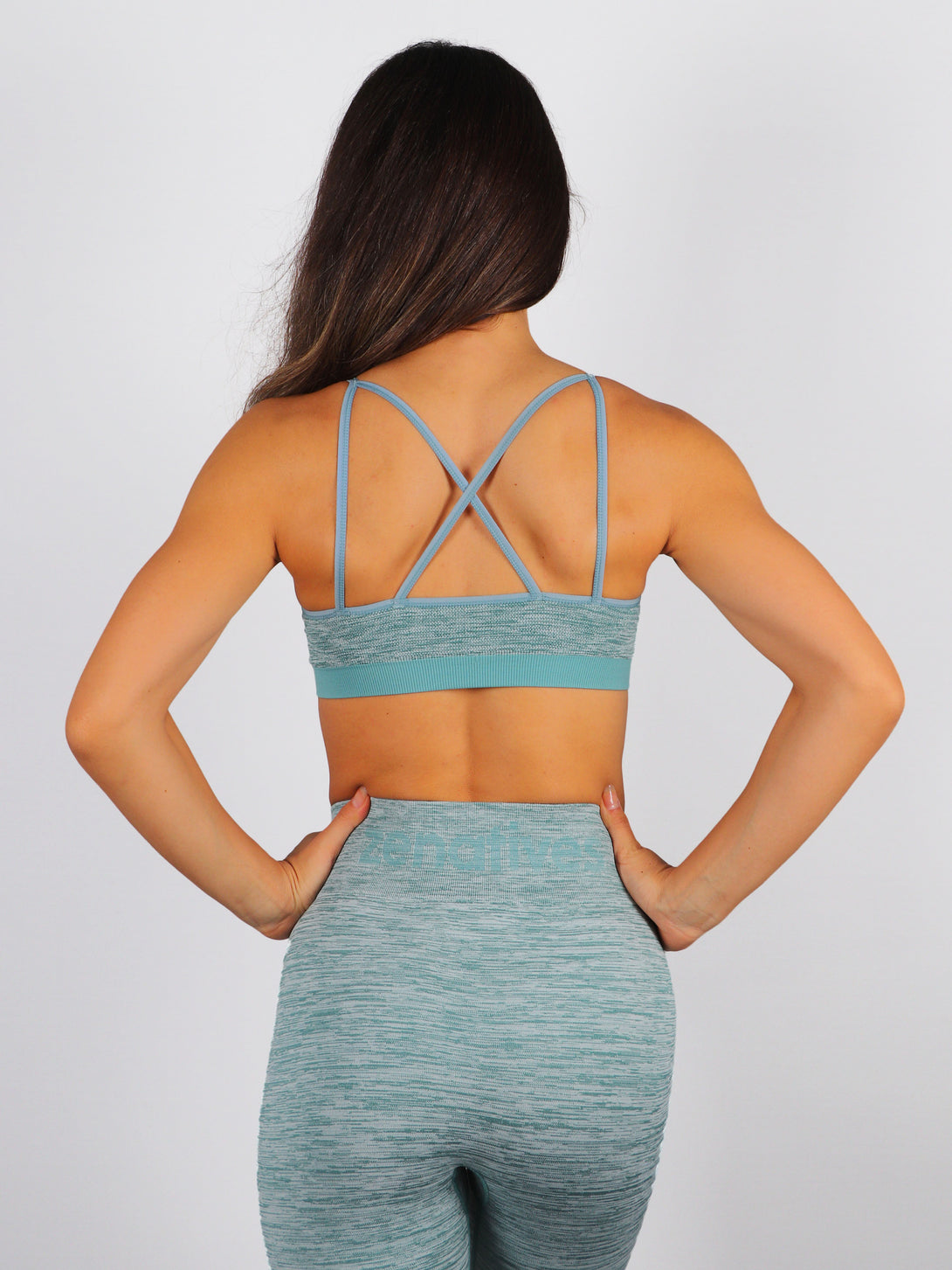 A Woman Wearing Arctic Color Seamless Reversible Light Support Sports Bra