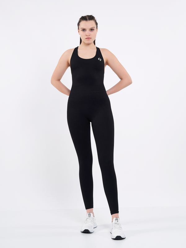 Color_Black Beauty | A Woman Wearing Deep Black Color Seamless Yoga Jumpsuit. Perfect Fit. Extra Flexible-Light