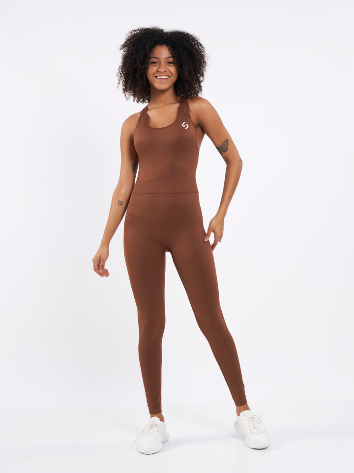 A Woman Wearing Toffee Color Seamless Yoga Jumpsuit. Perfect Fit. Extra Flexible-Light