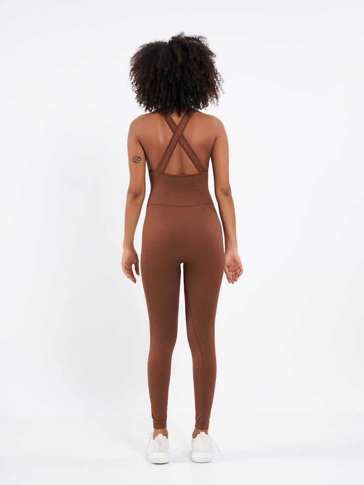 A Woman Wearing Toffee Color Seamless Yoga Jumpsuit. Perfect Fit. Extra Flexible-Light