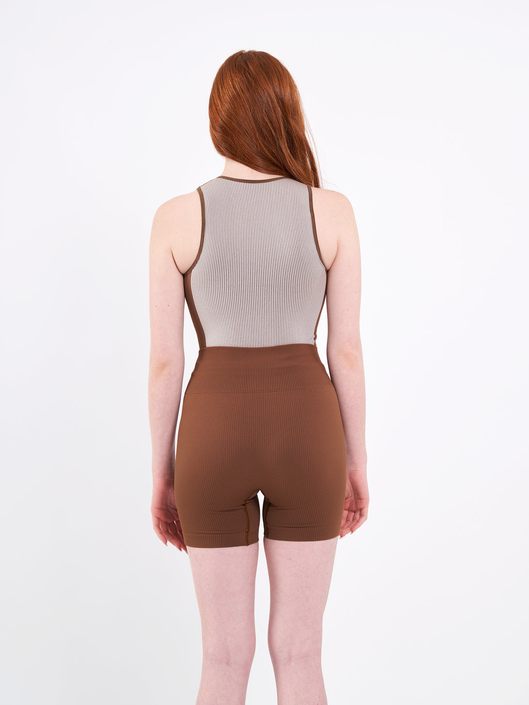 A Woman Wearing Toffe Brown Color Easy-Move Seamless Ribbed Crop Top for All-Day Wear