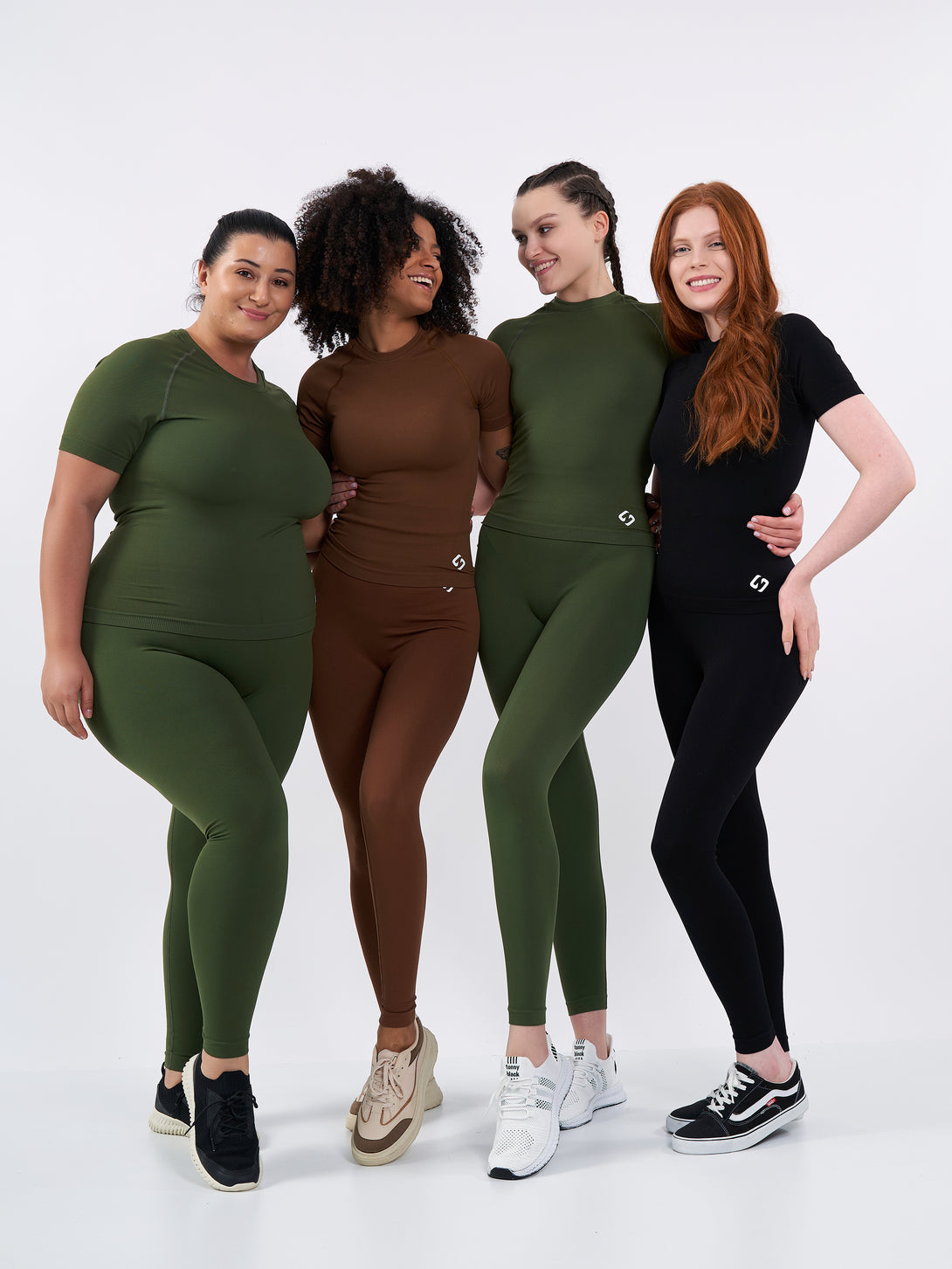 A Women Wearing Zen Khaki Color Zen Confidence Seamless Compressive T-Shirt. Sculpted Silhouette