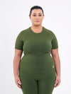 Color_Forest Green | A Women Wearing Zen Khaki Color Zen Confidence Seamless Compressive T-Shirt. Sculpted Silhouette
