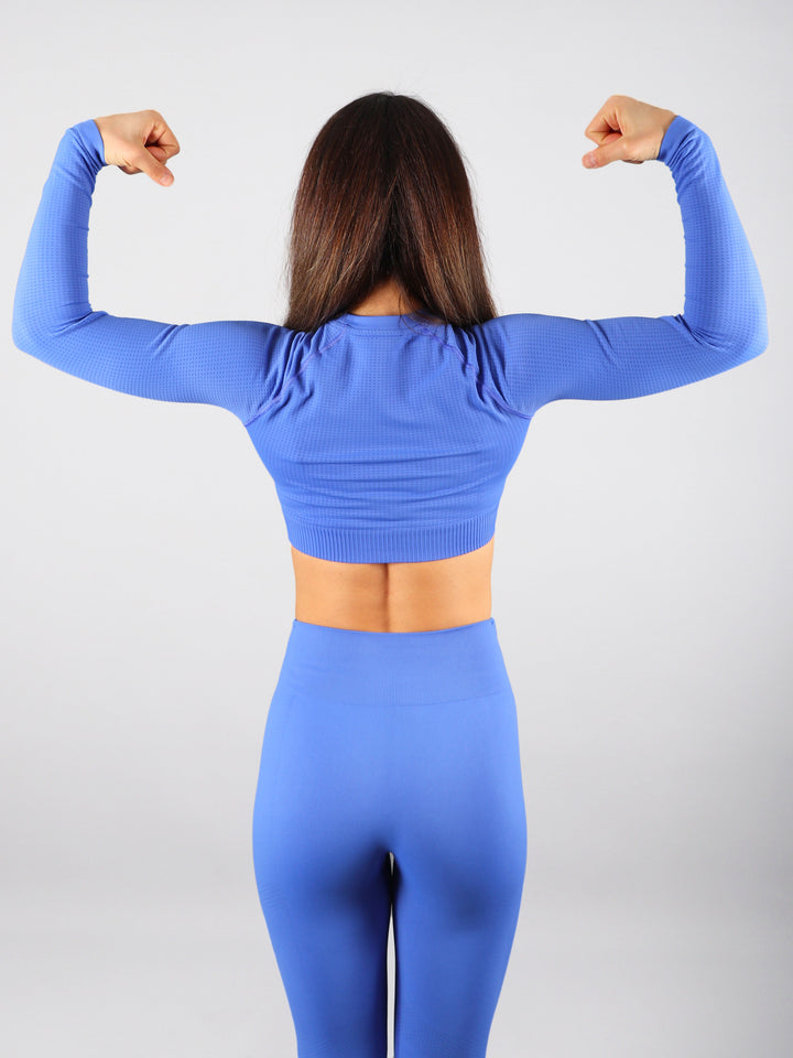 A Woman Wearing Sapphire Color The Main Long Sleeve Crop Top