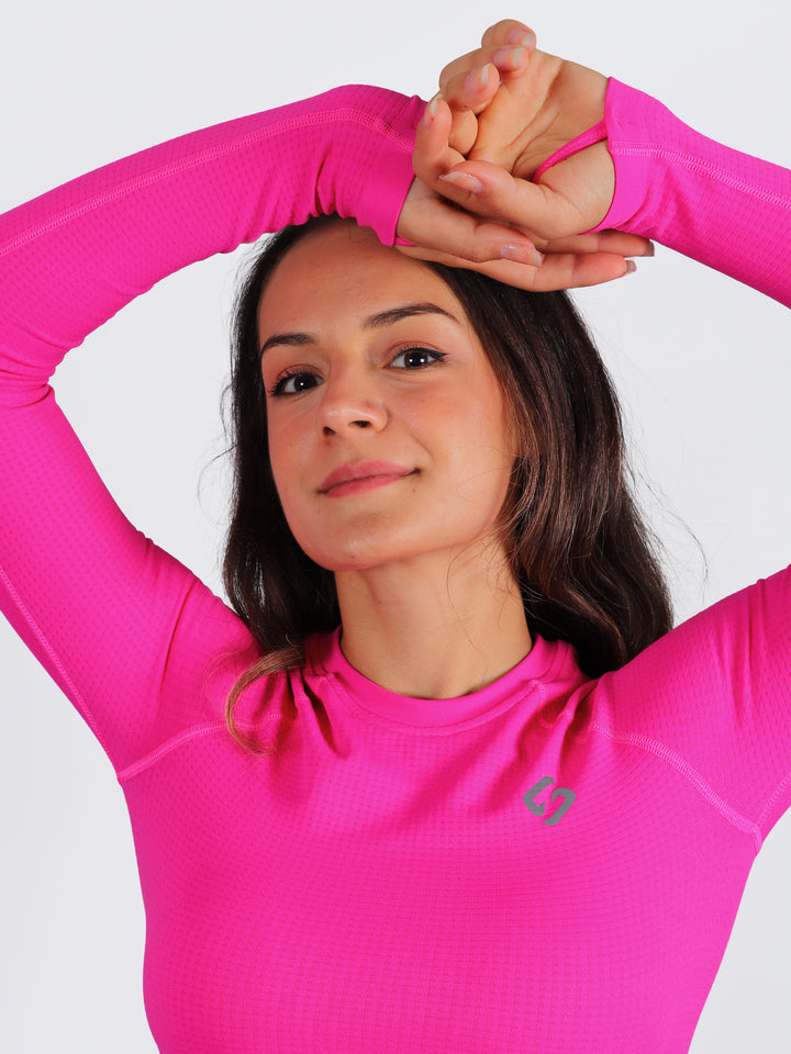A Woman Wearing Beetroot Color The Main Long Sleeve Crop Top