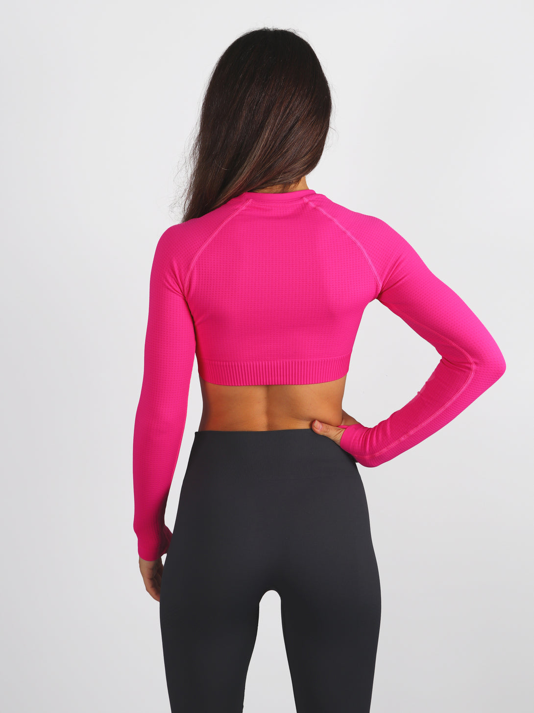 A Woman Wearing Beetroot Purple Color The Main Long Sleeve Crop Top