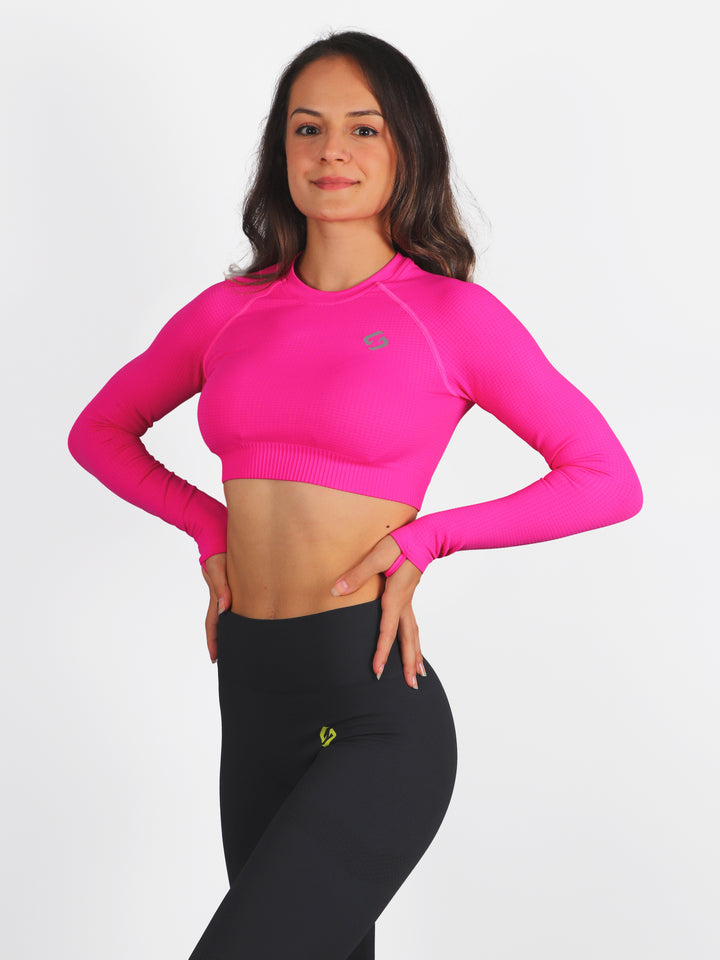 A Woman Wearing Beetroot Color The Main Long Sleeve Crop Top