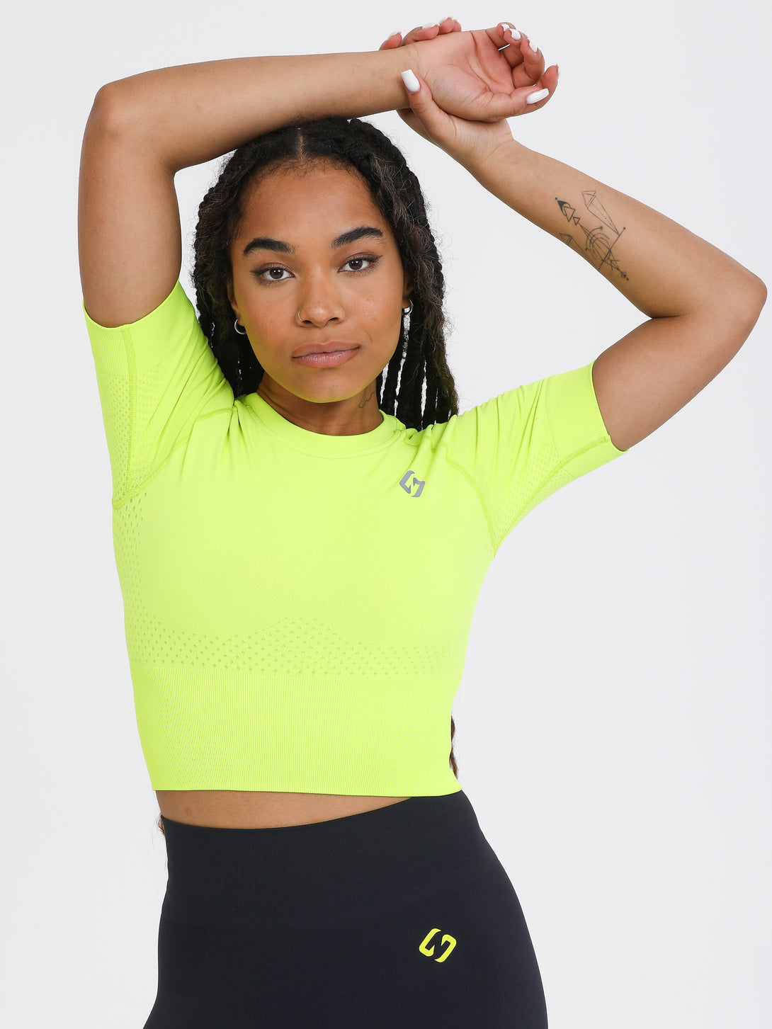 A Woman Wearing Lime Color The Main Short Sleeve Crop Top