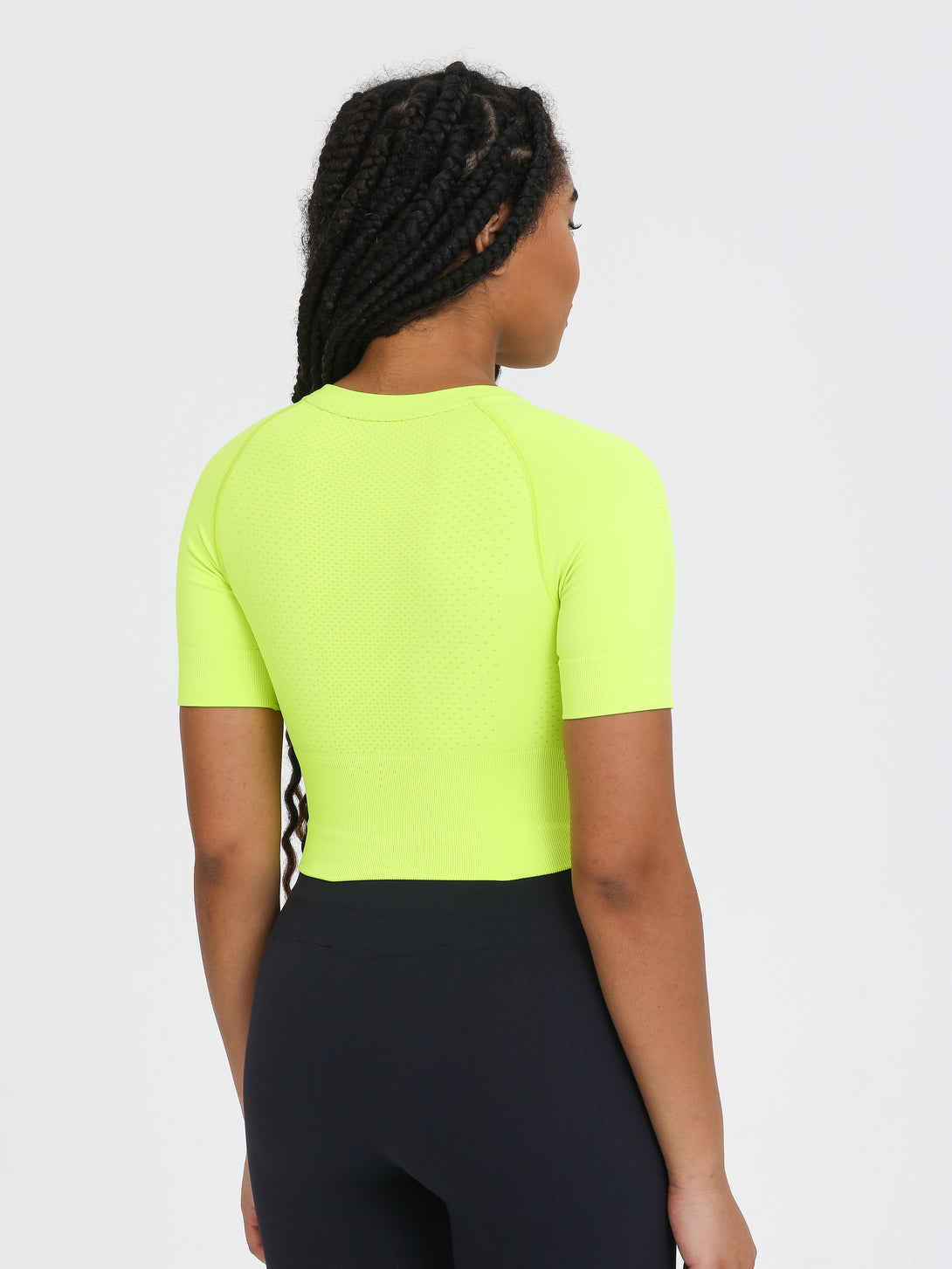 A Woman Wearing Lime Color The Main Short Sleeve Crop Top