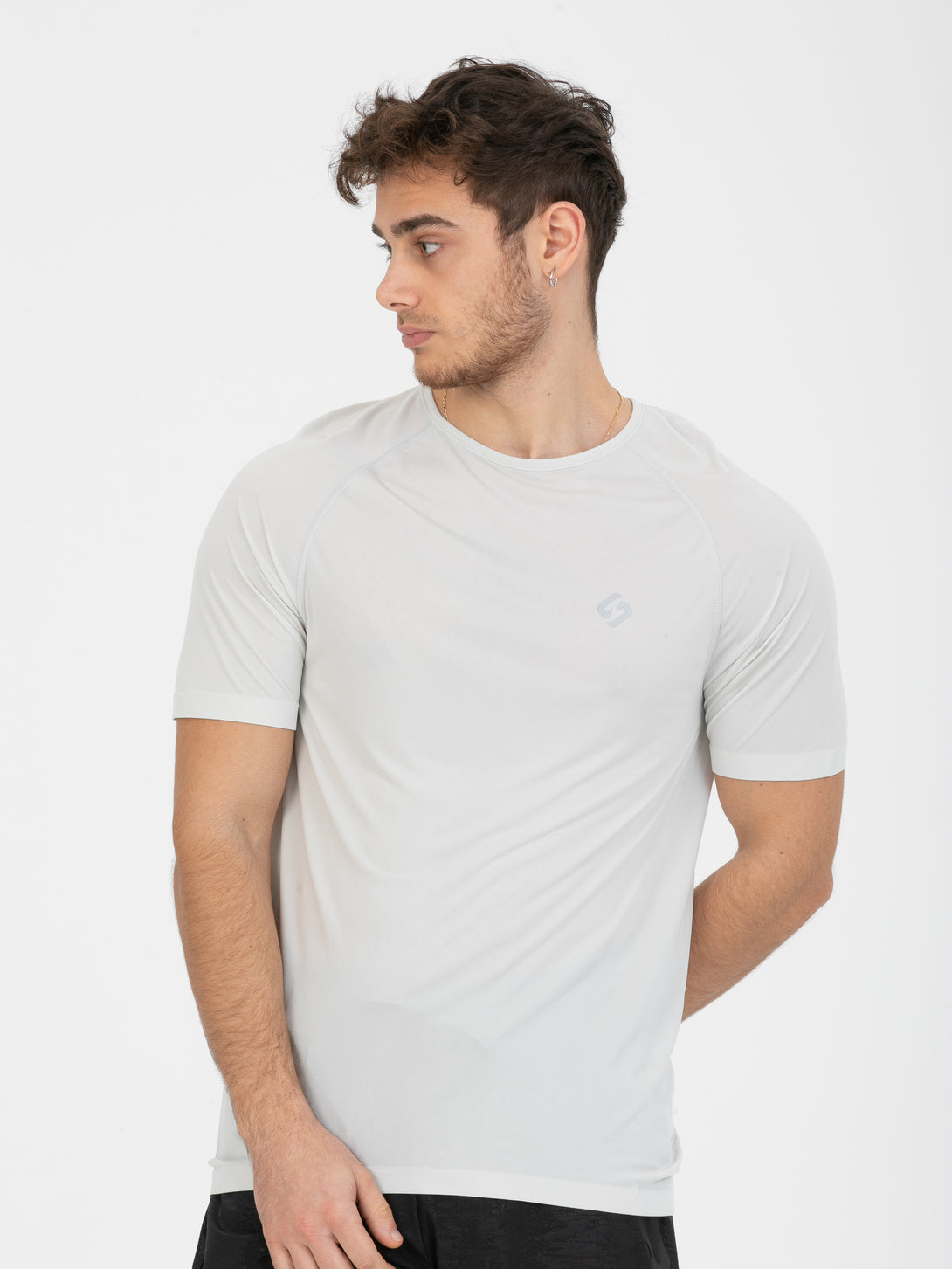 A Man Wearing Light Grey Color Seamless The Motion T-Shirt