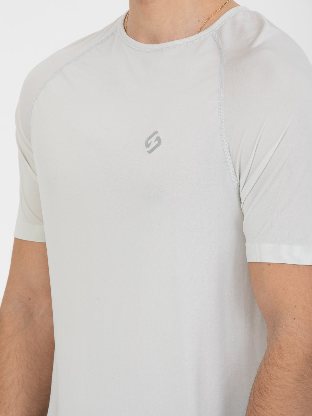A Man Wearing Light Grey Color Seamless The Motion T-Shirt