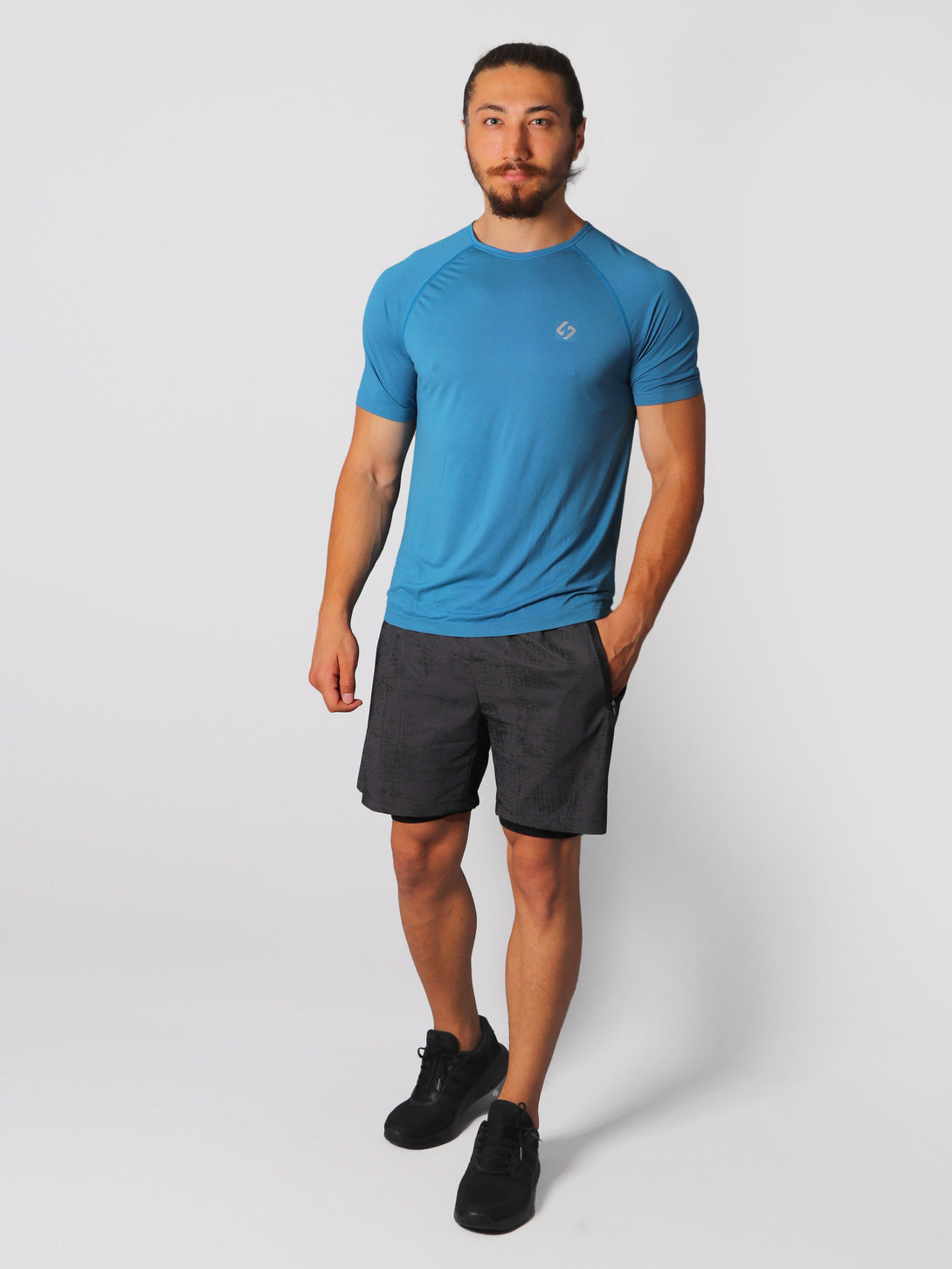 A Man Wearing Saxony Blue Color Seamless The Motion T-Shirt