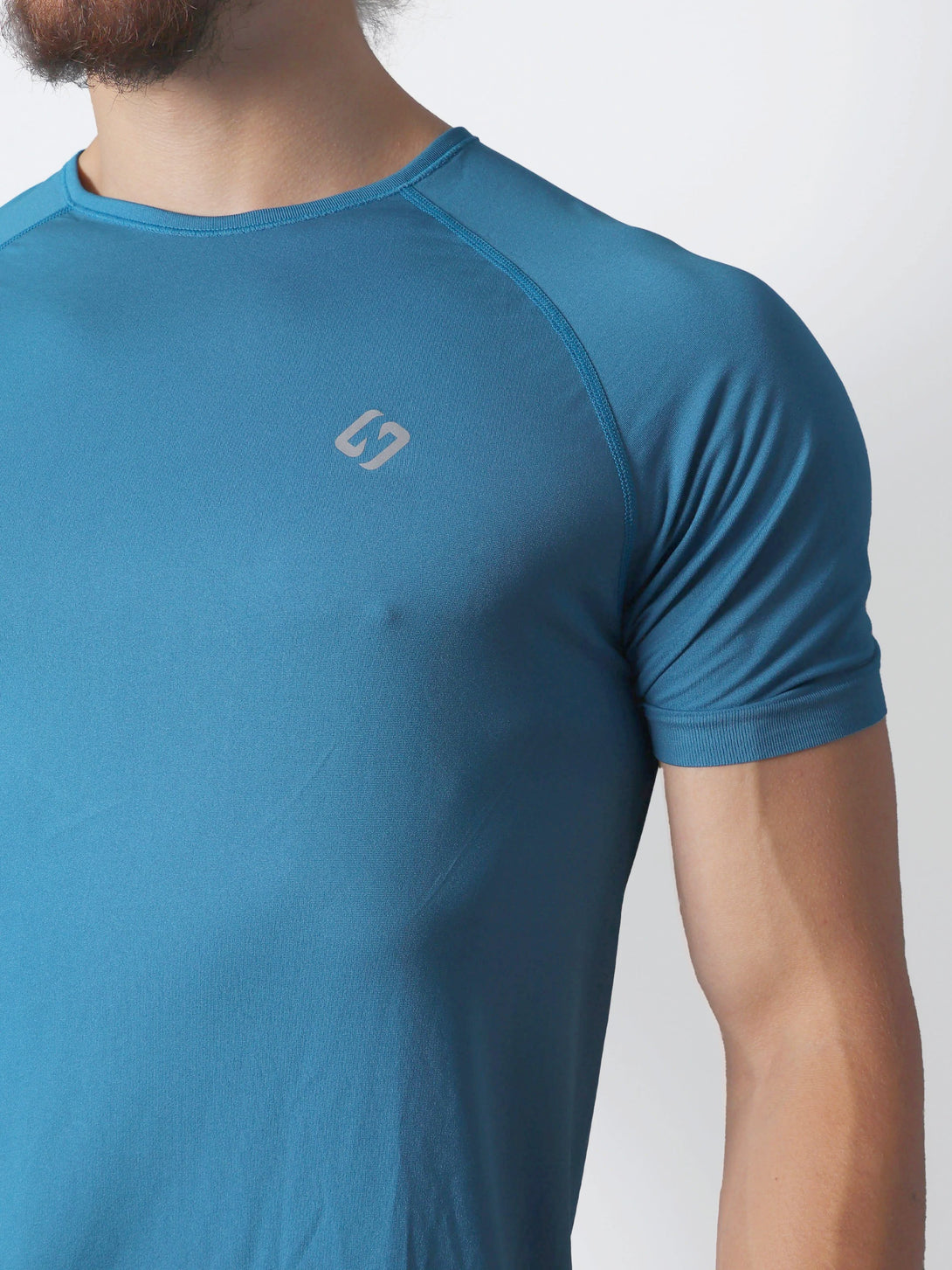 A Man Wearing Saxony Blue Color Seamless The Motion T-Shirt