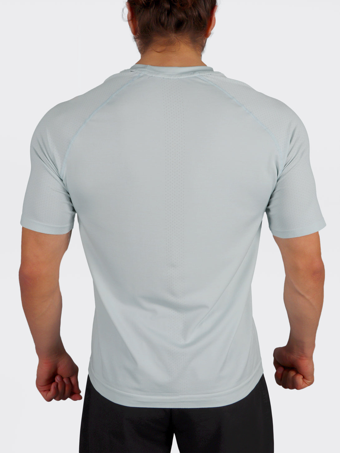 A Man Wearing Baby Blue Color Seamless Workout Comfort T-Shirt