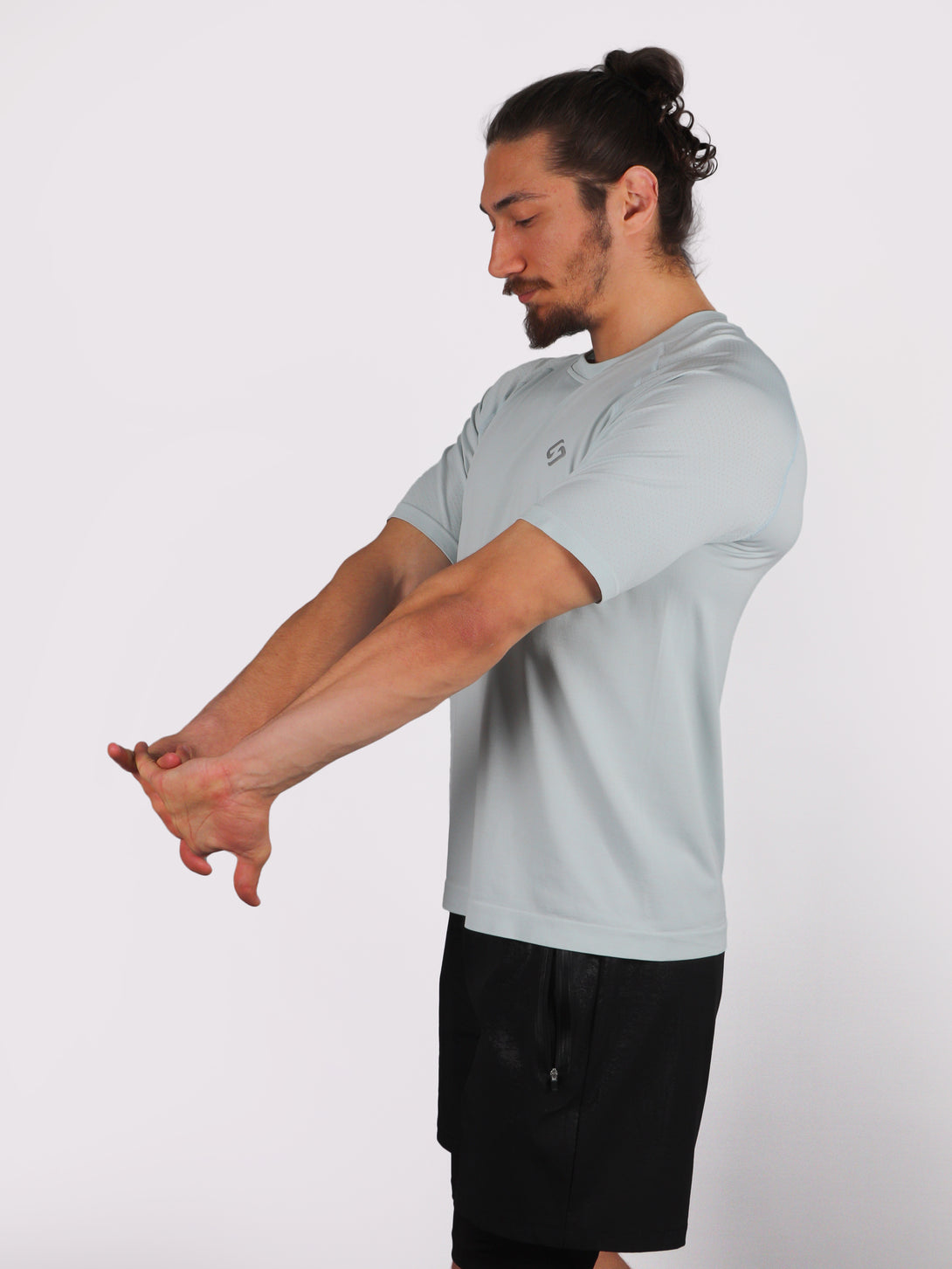 A Man Wearing Baby Blue Color Seamless Workout Comfort T-Shirt