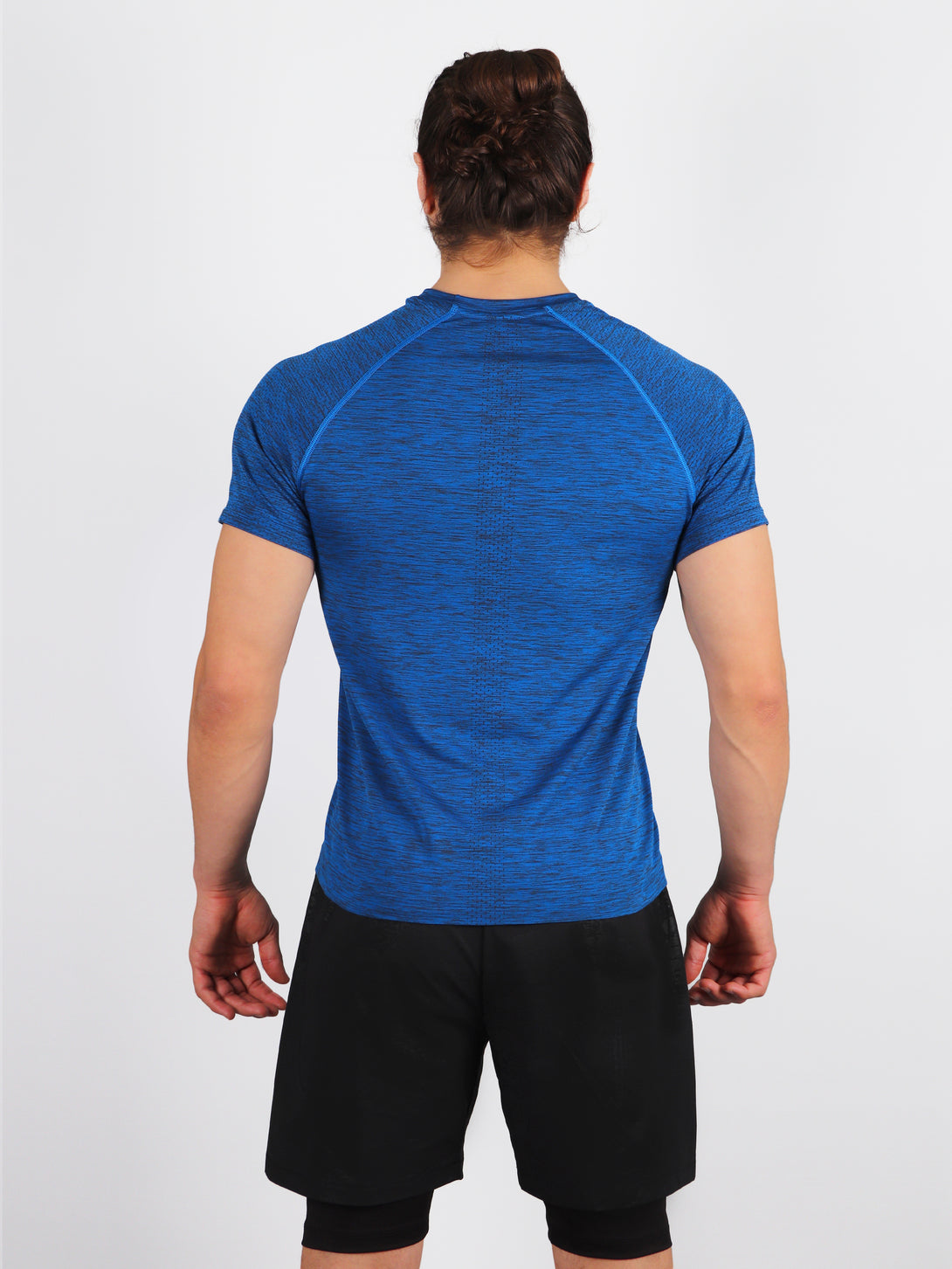 A Man Wearing Lapis Blue Color Seamless Workout Comfort T-Shirt