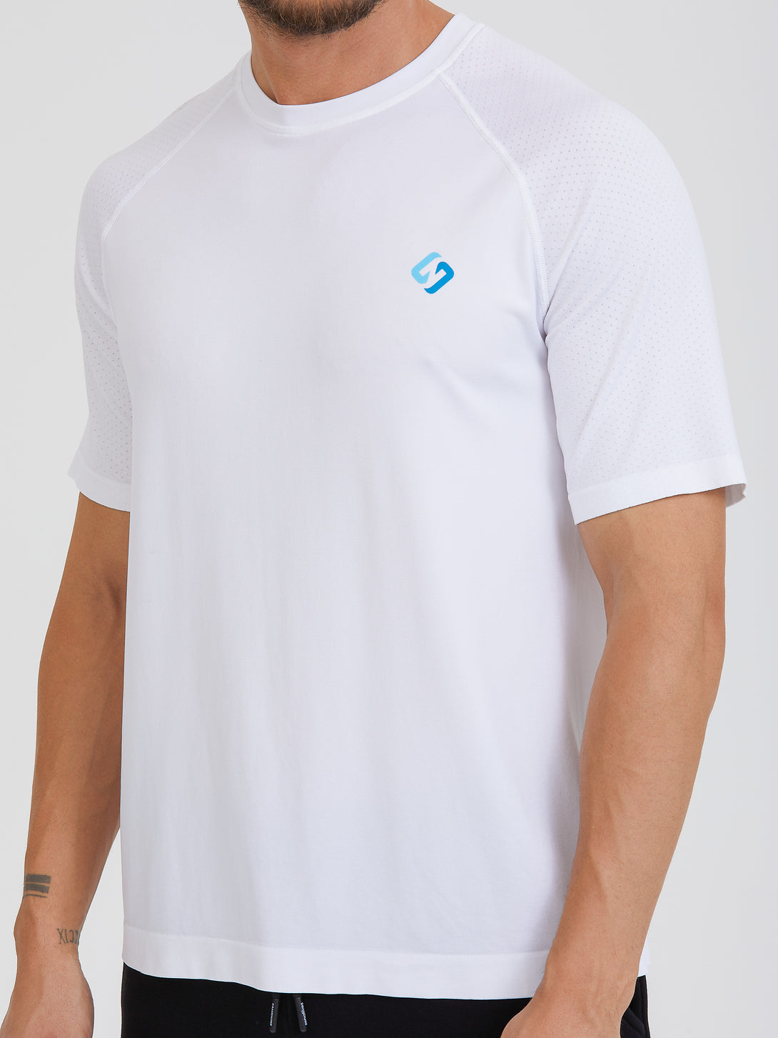 A Man Wearing White Color Seamless Workout Comfort T-Shirt