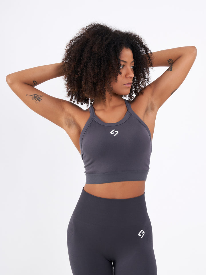 A Woman Wearing Stone Coal Color Zen Perfect Seamless High-Impact Sports Bra With Padding