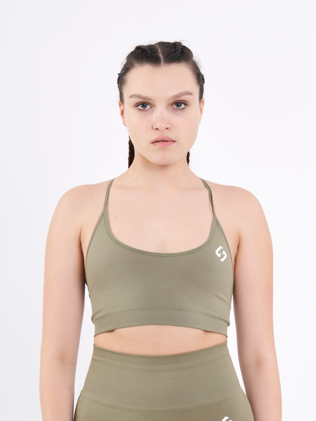 A Woman Wearing Olive Color Zen Perfect Low Impact Bra