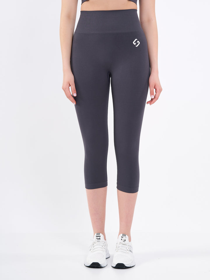 A Woman Wearing Anthracite Color Zen Perfect Seamless High-Waist Crop Leggings. Perfect Fit