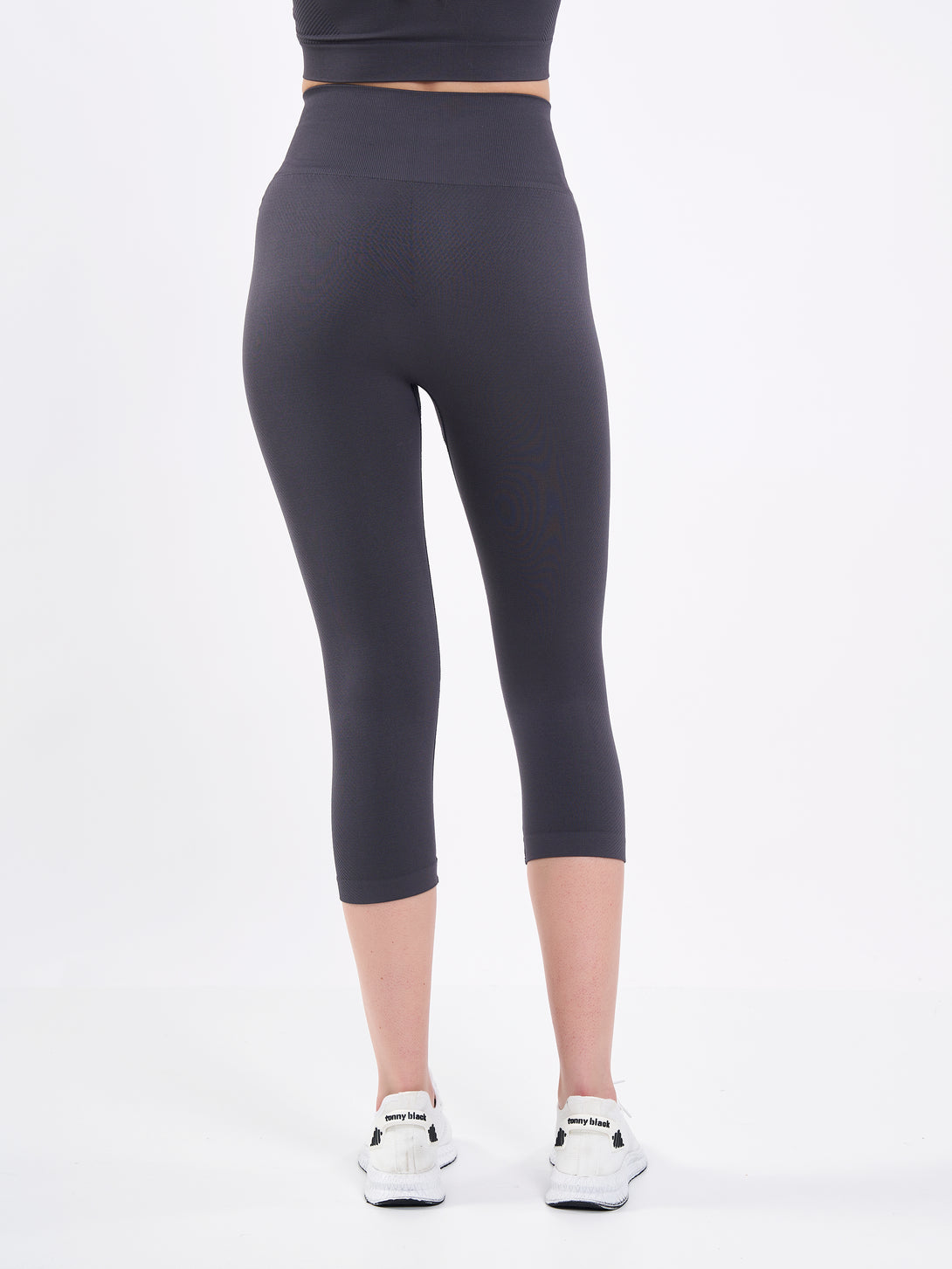 A Woman Wearing Anthracite Color Zen Perfect Seamless High-Waist Crop Leggings. Perfect Fit