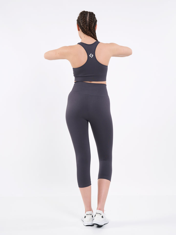 A Woman Wearing Anthracite Color Zen Perfect Seamless High-Waist Crop Leggings. Perfect Fit