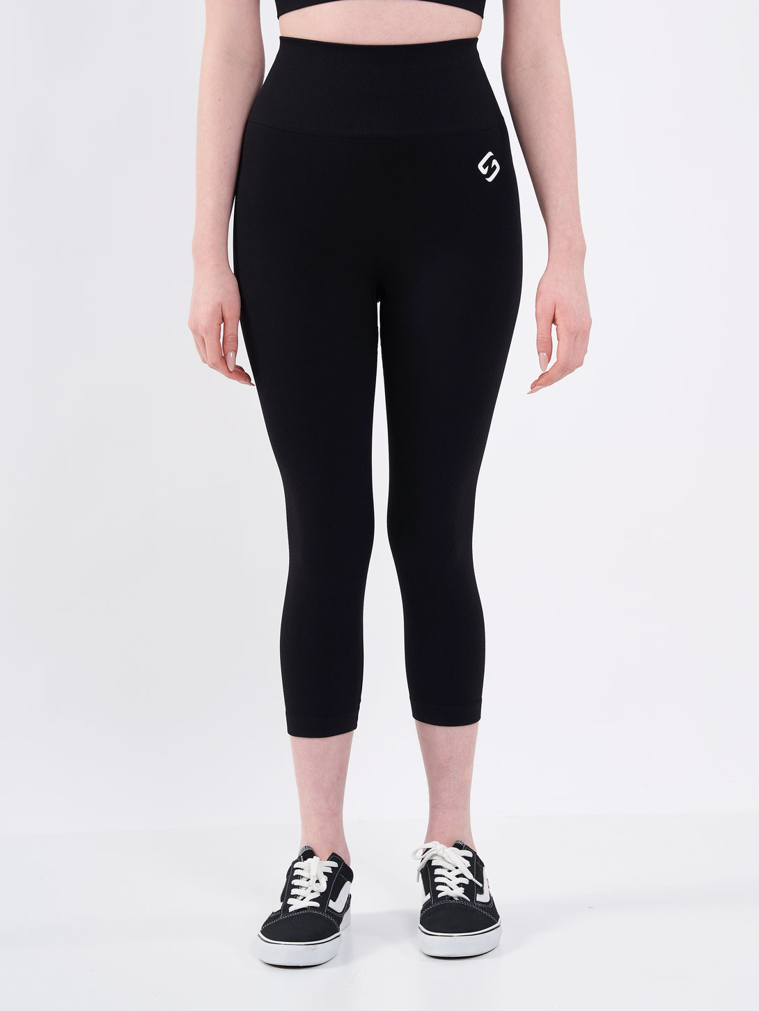 A Woman Wearing Deep Black Color Zen Perfect Seamless High-Waist Crop Leggings. Perfect Fit