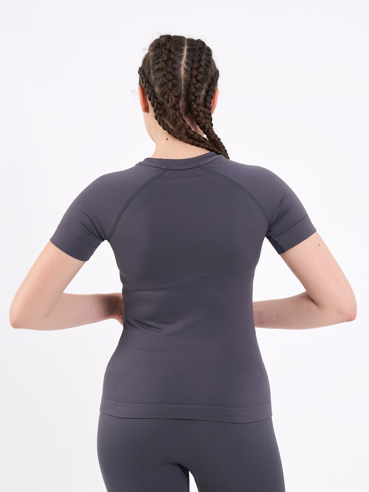 A Women Wearing Anthracite Color Zen Perfect Seamless T-Shirt. Extra-Soft