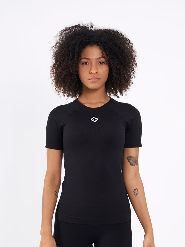 Color_Black Beauty | A Women Wearing Deep Black Color Zen Perfect Seamless T-Shirt. Extra-Soft