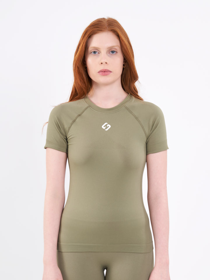 A Women Wearing Olive Color Zen Perfect Seamless T-Shirt. Extra-Soft
