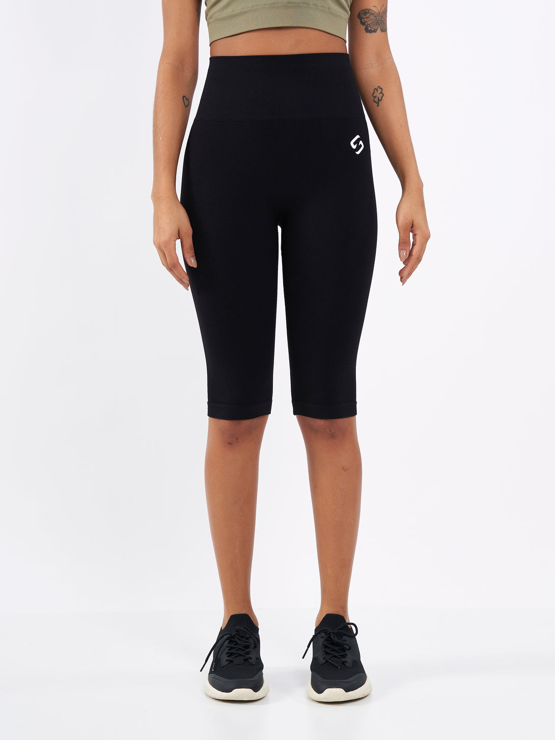 A Woman Wearing Deep Black Color Zen Perfect Seamless High-Waist Longline Shorts. Perfect Fit