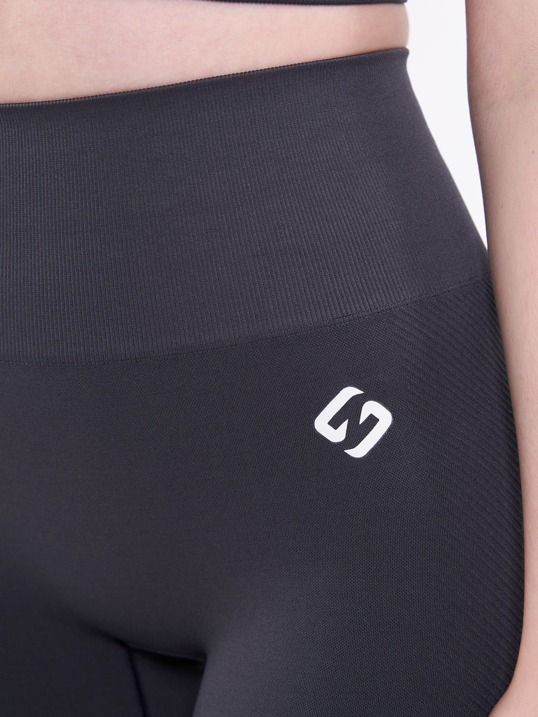 A Woman Wearing Anthracite Color Zen Perfect Seamless High-Waist Shorts. Perfect Fit