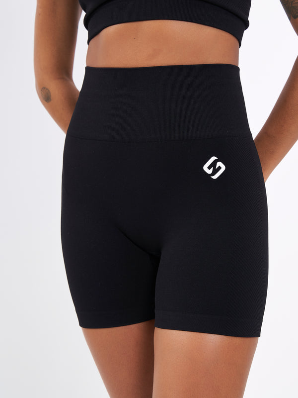Color_Black Beauty | A Woman Wearing Deep Black Color Zen Perfect Seamless High-Waist Shorts. Perfect Fit