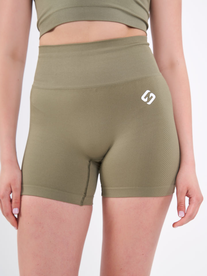 A Woman Wearing Olive Color Zen Perfect Seamless High-Waist Shorts. Perfect Fit