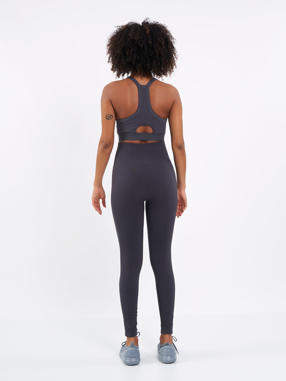 A Woman Wearing Anthracite Color Zen Perfect Seamless High-Waist Ankle-Length Leggings. Perfect Fit