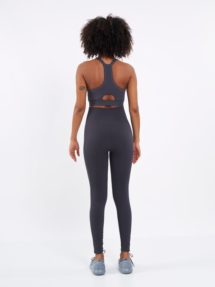 A Woman Wearing Stone Coal Color Zen Perfect Seamless High-Waist Ankle-Length Leggings. Perfect Fit