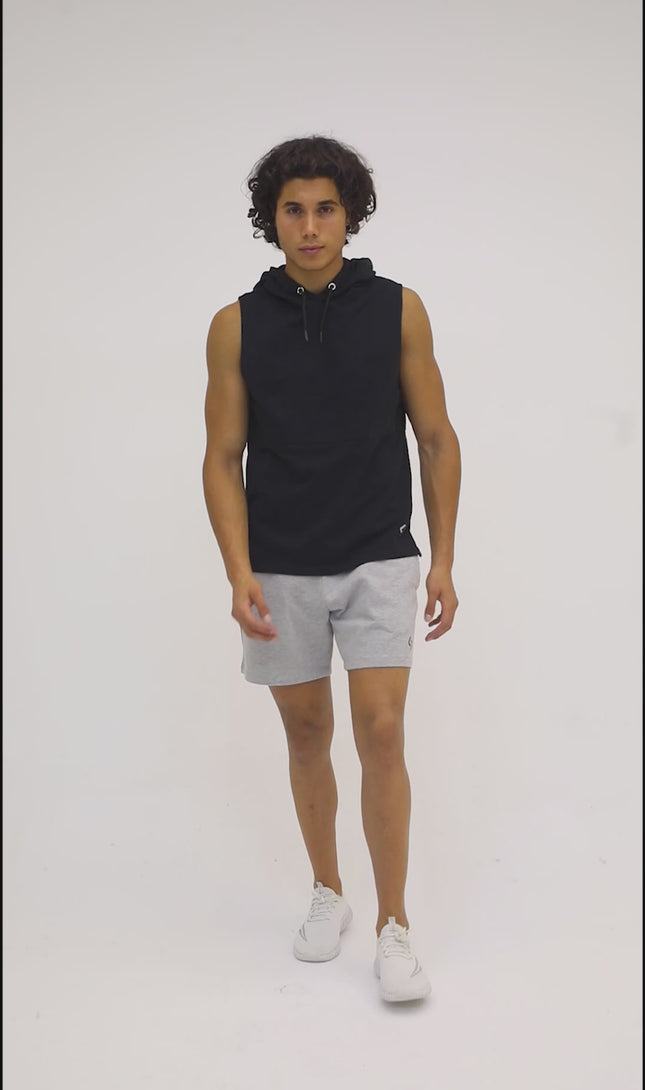 Color_Light Grey Melange | A Man Wearing Light Grey Melange Color Essential Mens Workout Shorts