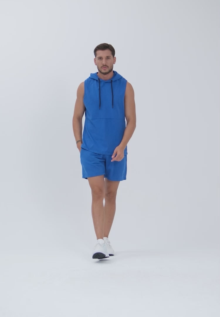 A Man Wearing Saxony Blue Color Essential Mens Workout Shorts