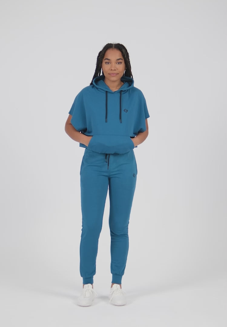 A Woman Wearing Saxony Blue Color All-Day Essential Sweatshirt