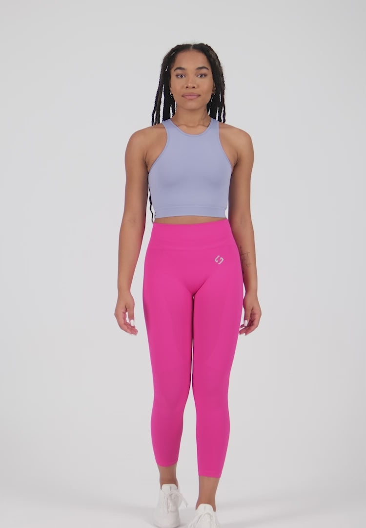 A Woman Wearing Limeade Color All-Day Seamless Sleeveless Crop Top