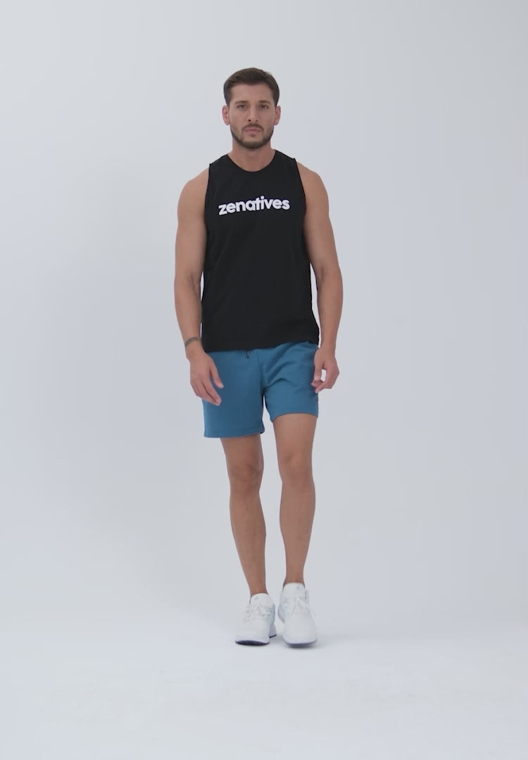 Color_Lapis Blue | A Man Wearing Lapis Blue Color Essential Mens Workout Shorts