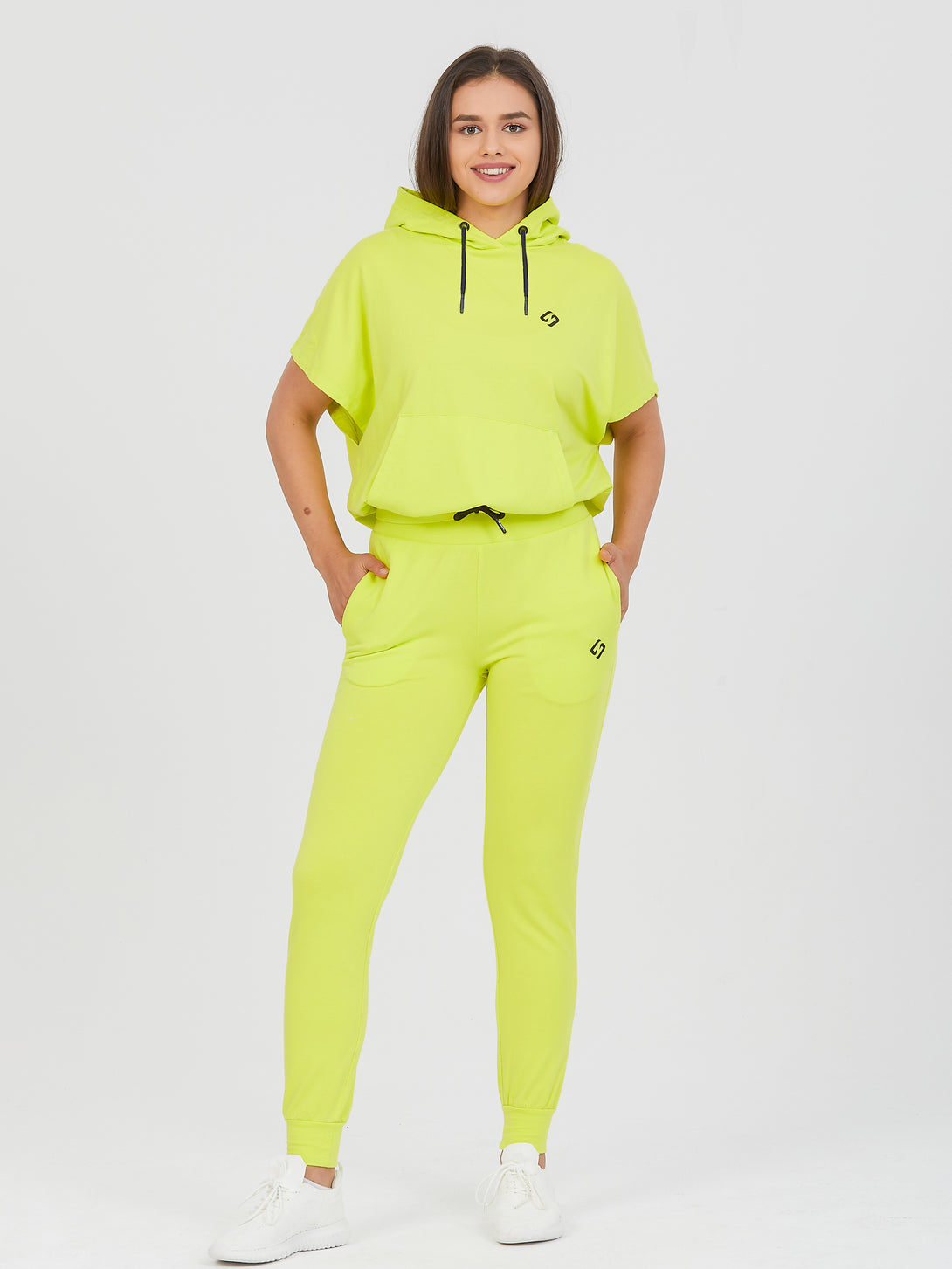 A Woman Wearing Limeade Color All-Day Essential Sweatshirt