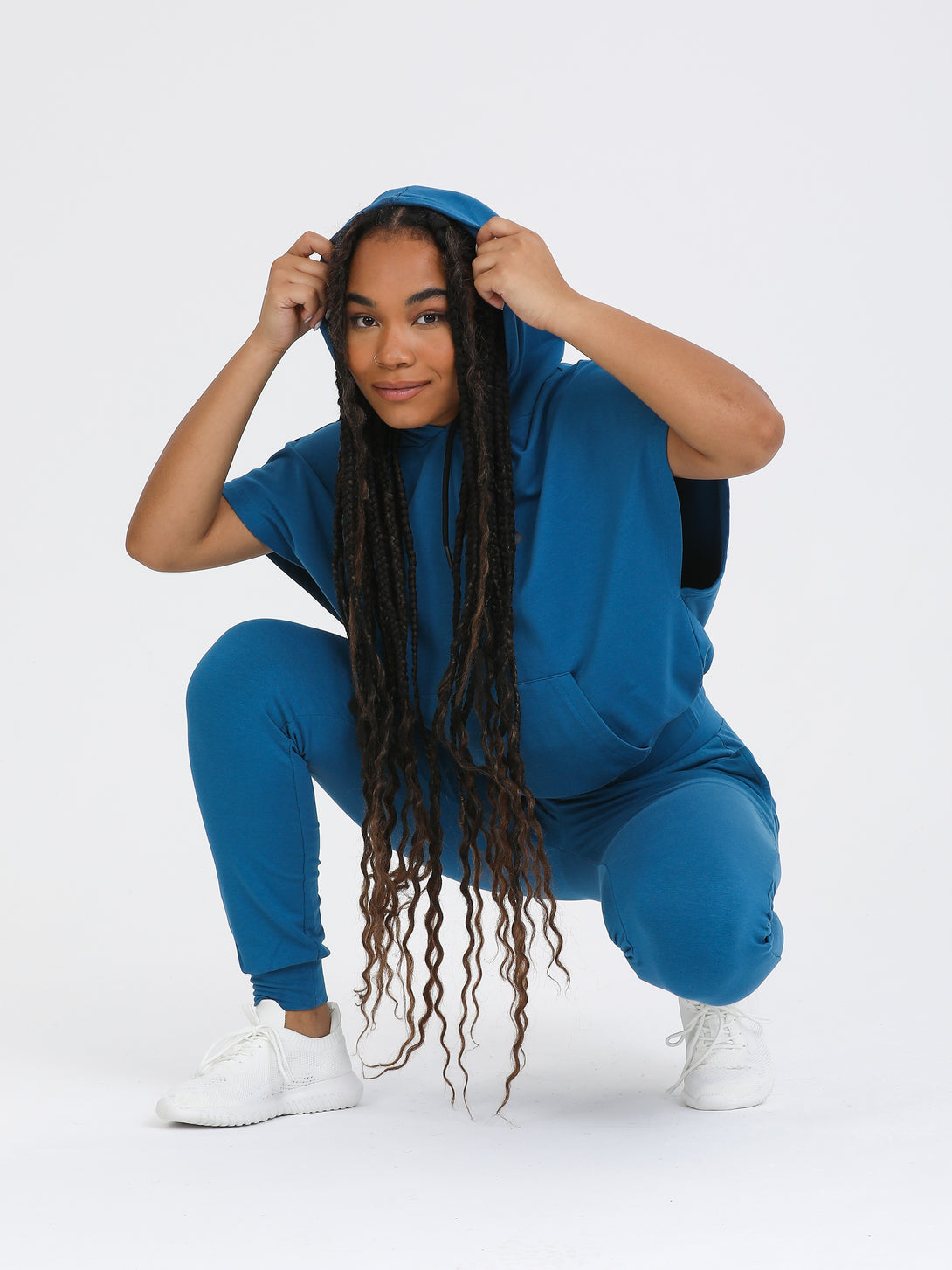 A Woman Wearing Saxony Blue Color All-Day Essential Sweatshirt