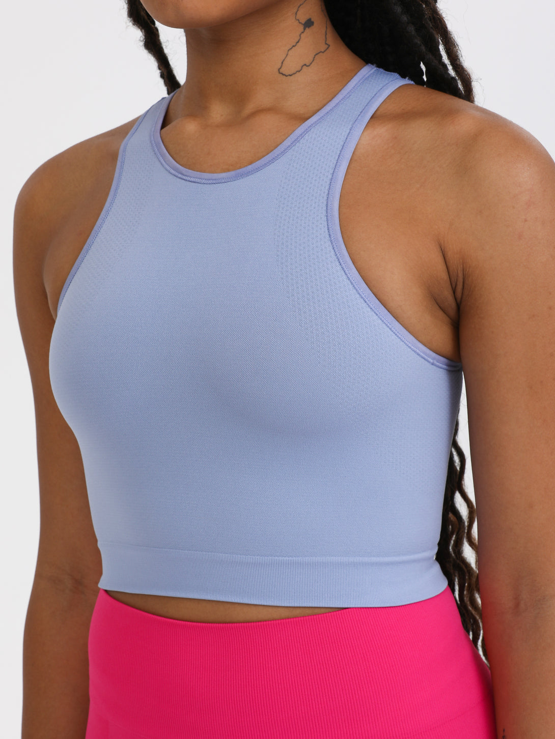 A Woman Wearing Purple Impression Color All-Day Seamless Sleeveless Crop Top