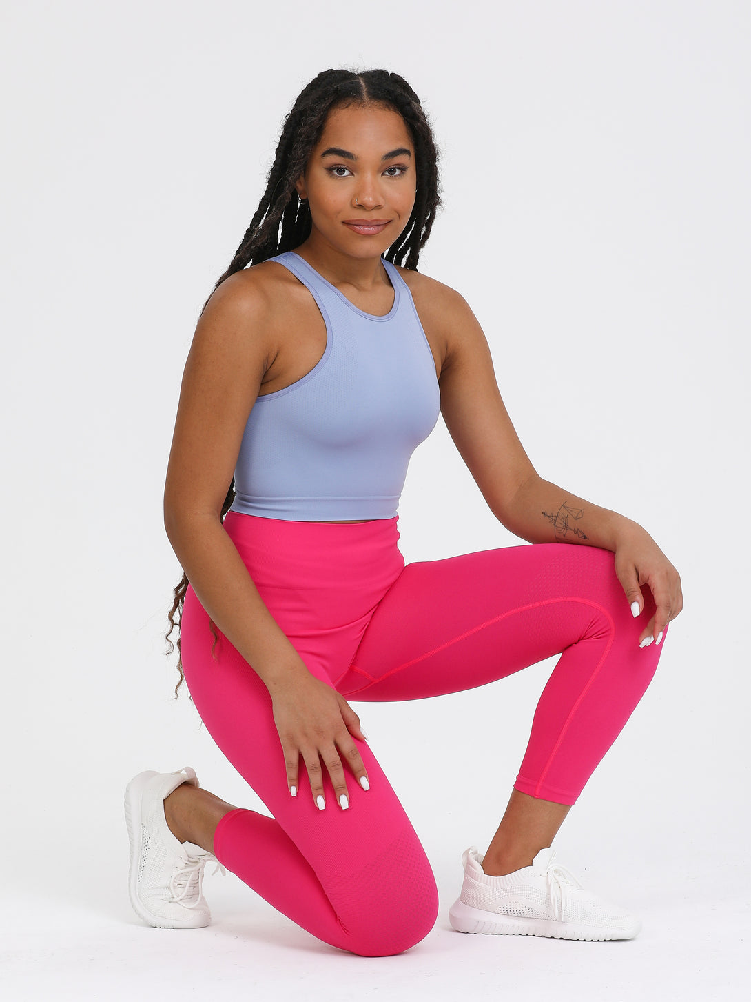 A Woman Wearing Purple Impression Color All-Day Seamless Sleeveless Crop Top