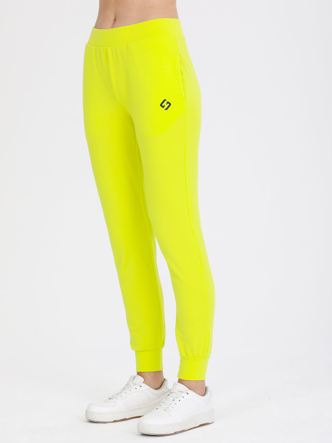 A Woman Wearing Limeade Color All-Day Womens Jersey Jogger